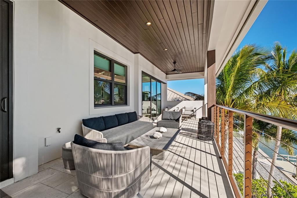 459 20th Avenue Indian Rocks Beach, FL 33785 - Photo 37 of 70 a living room with furniture and a potted plant