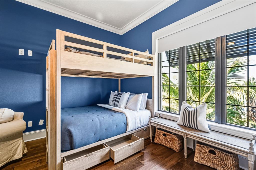 459 20th Avenue Indian Rocks Beach, FL 33785 - Photo 40 of 70 a bedroom with a bed and a large window