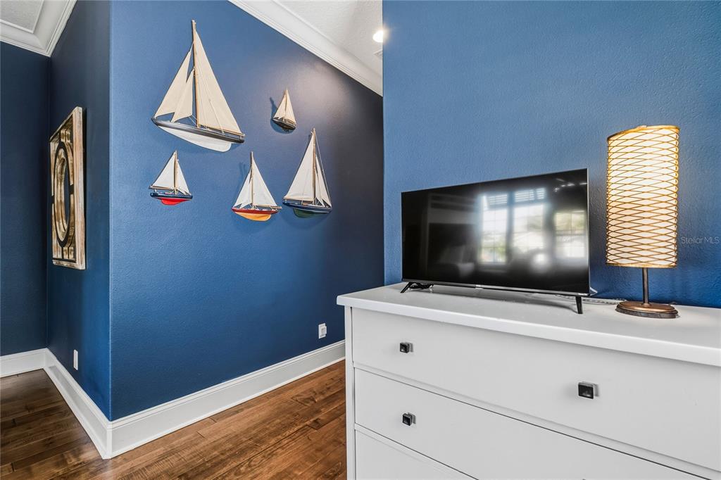 459 20th Avenue Indian Rocks Beach, FL 33785 - Photo 42 of 70 a bathroom with a sink a mirror and a light fixture