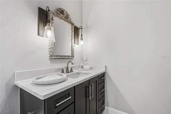 a bathroom with a bathtub and a sink