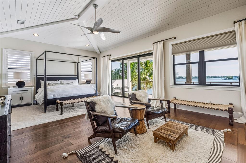 459 20th Avenue Indian Rocks Beach, FL 33785 - Photo 54 of 70 a living room with furniture a piano and a table