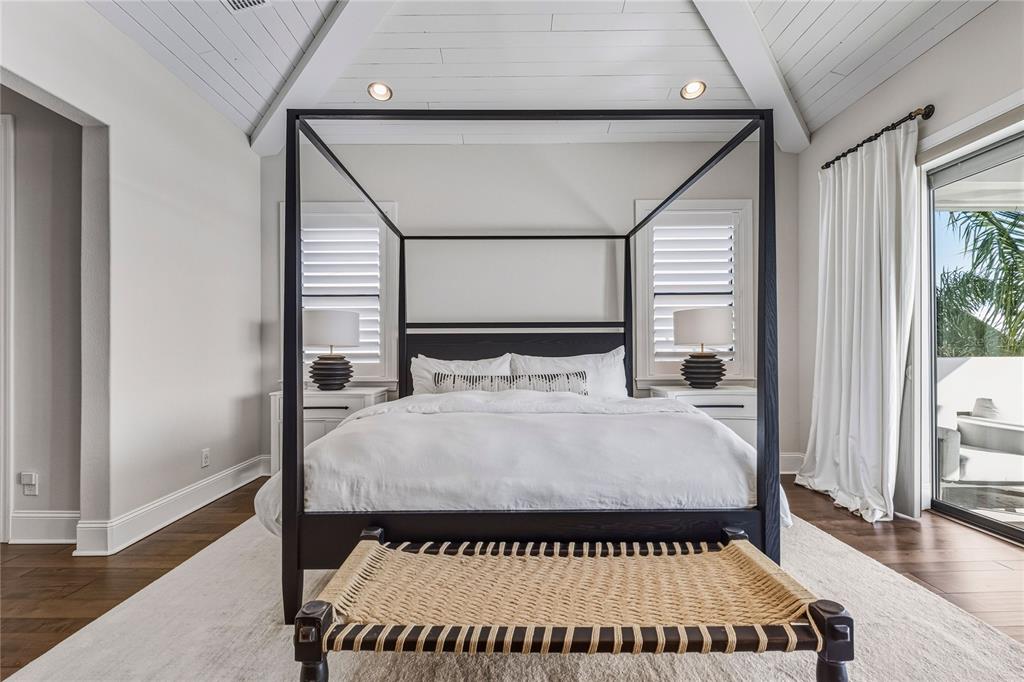 459 20th Avenue Indian Rocks Beach, FL 33785 - Photo 56 of 70 a bed sitting in a bedroom next to a window