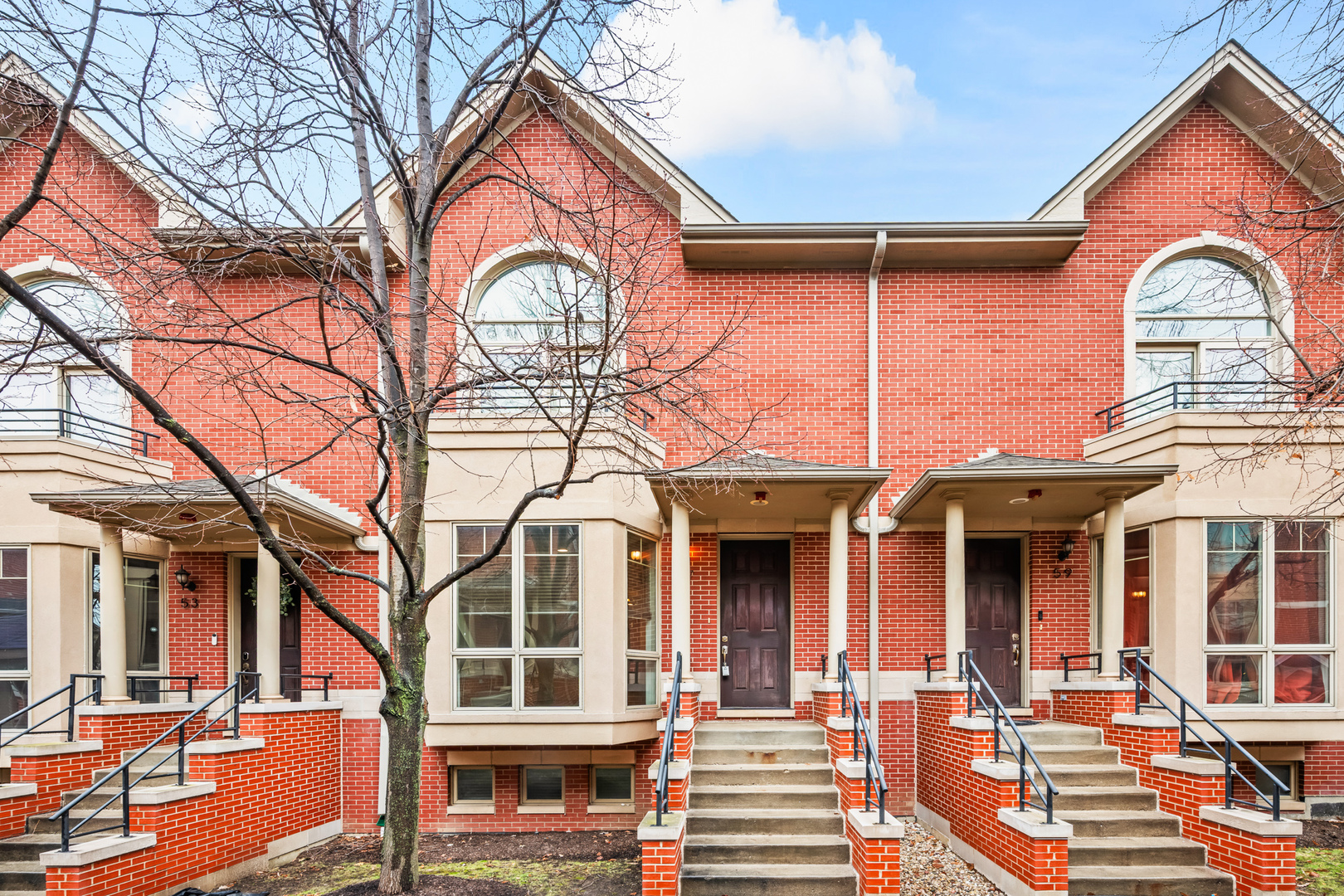a front view of a multi story residential apartment building