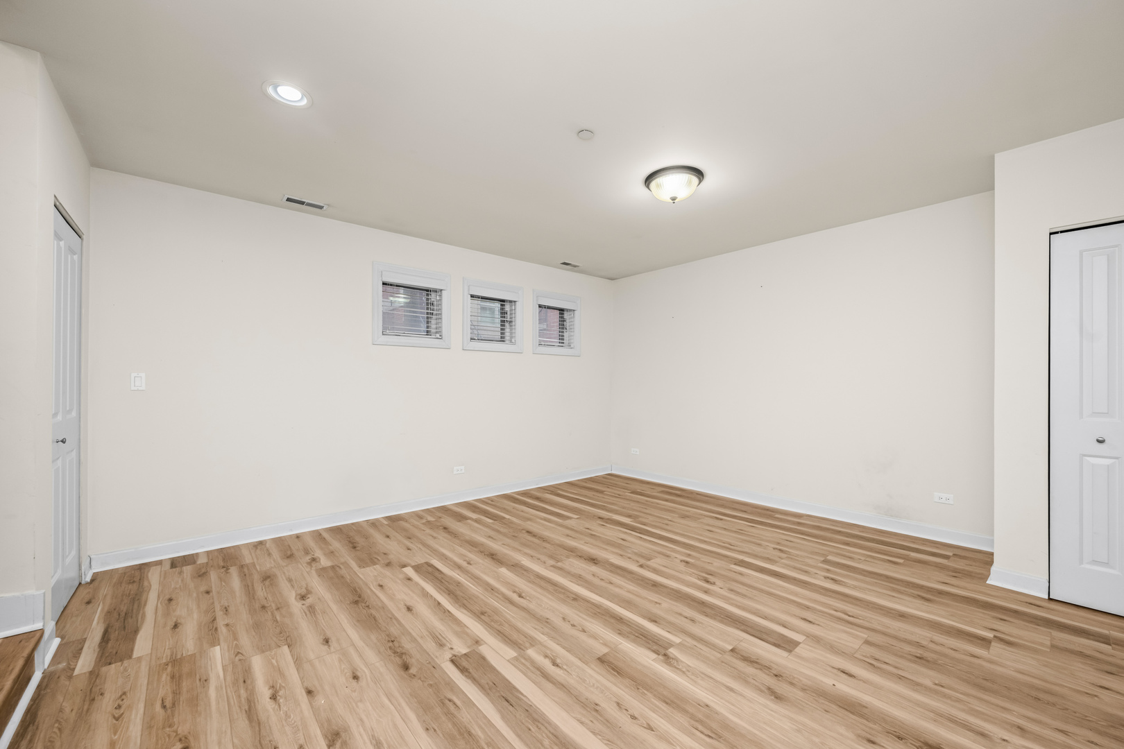 57 Northfield Terrace, Unit 57 Wheeling, IL 60090 - Photo 14 of 16 a view of empty room with wooden floor