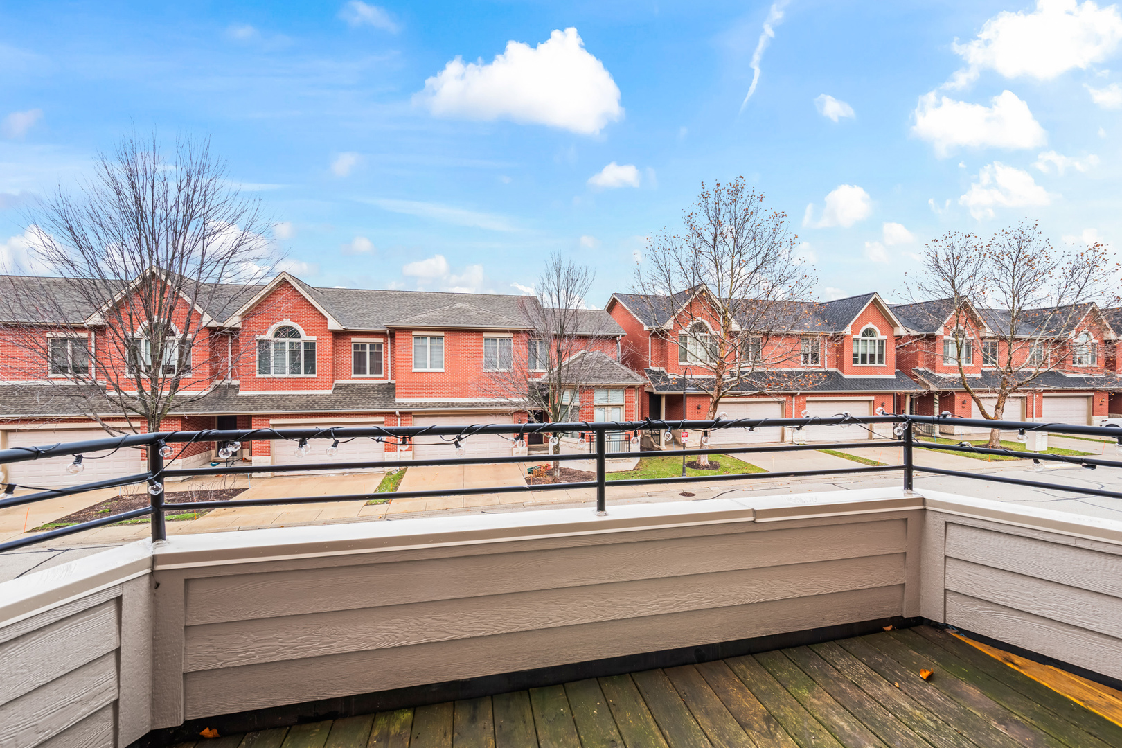 57 Northfield Terrace, Unit 57 Wheeling, IL 60090 - Photo 15 of 16 a view of a city from a balcony