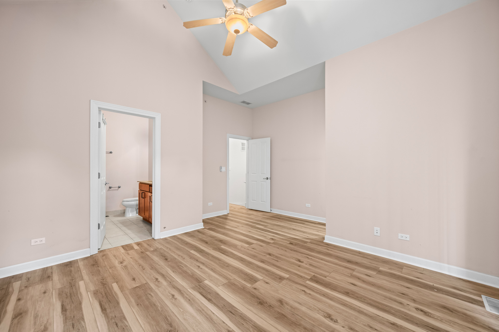 57 Northfield Terrace, Unit 57 Wheeling, IL 60090 - Photo 8 of 16 a view of empty room with wooden floor