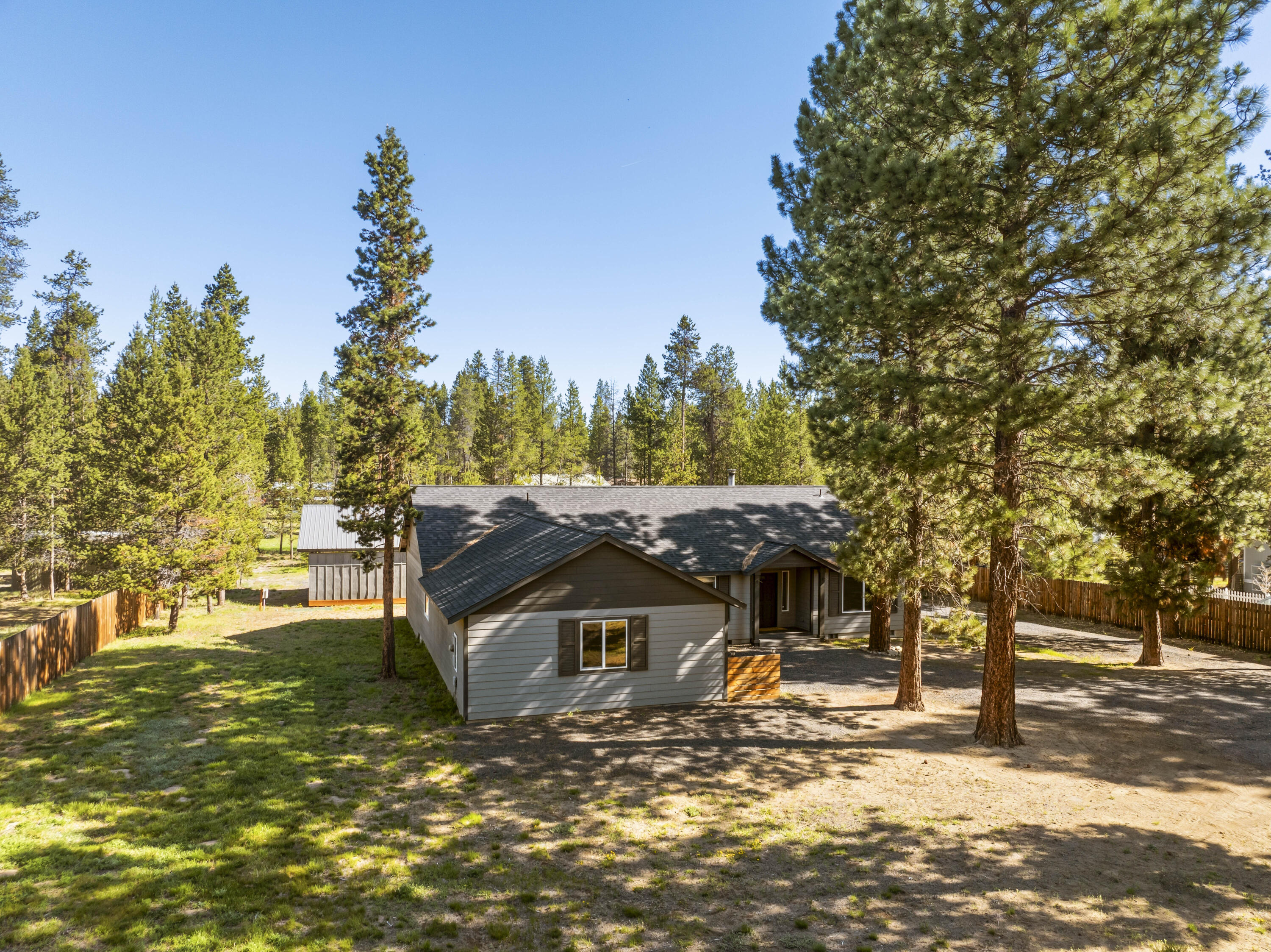 16050 Dick Road La Pine, OR 97739 - Photo 53 of 59 a view of a house with a yard