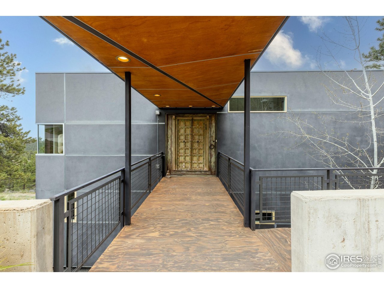 1440 Reed Ranch Road Boulder, CO 80302 - Photo 2 of 40 A peaceful oasis that incorporates design elements from around the world.