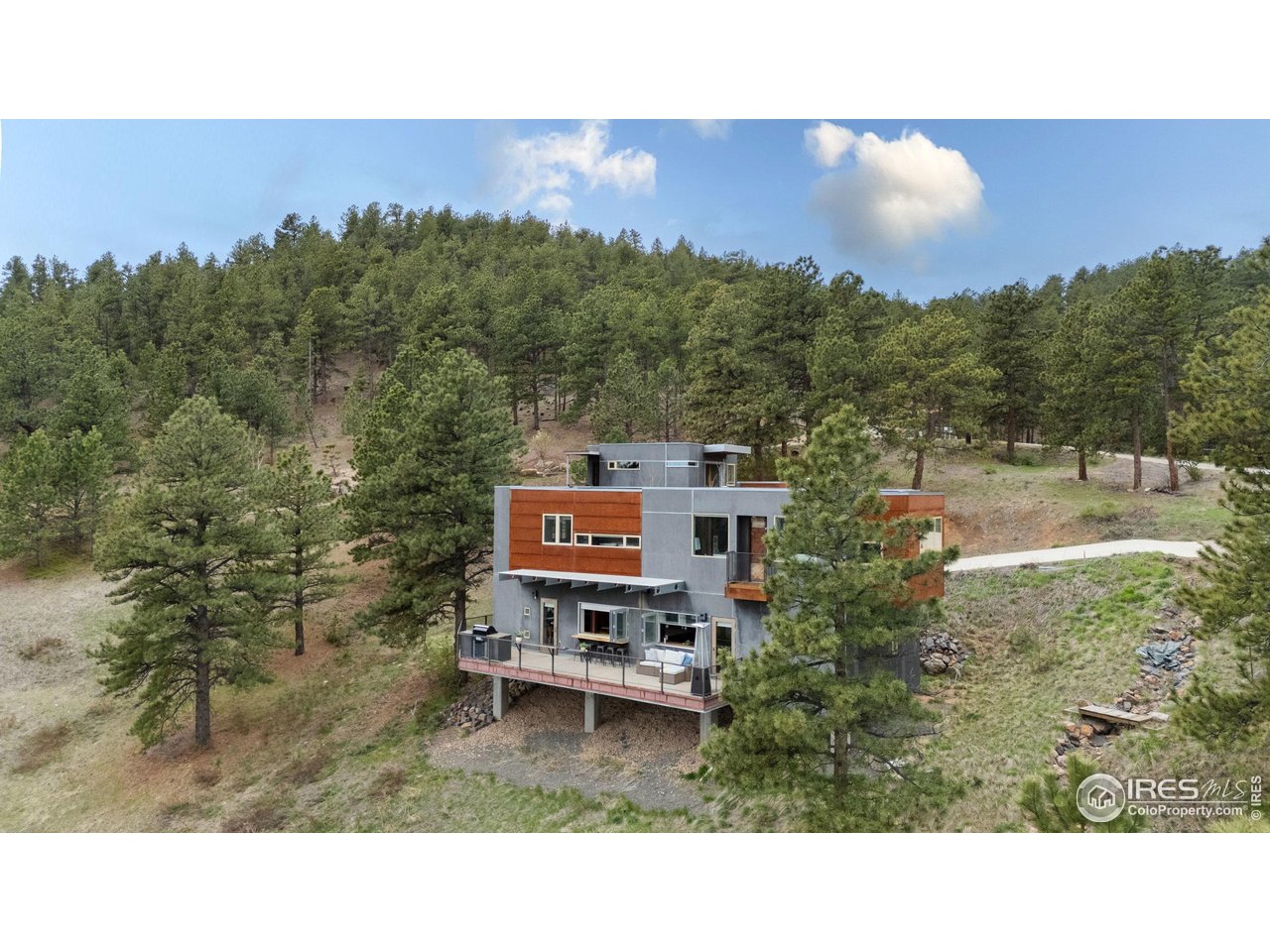 1440 Reed Ranch Road Boulder, CO 80302 - Photo 3 of 40 Located only 11 minutes from Broadway on 36 acres of meadow, woods, and rock outcroppings.