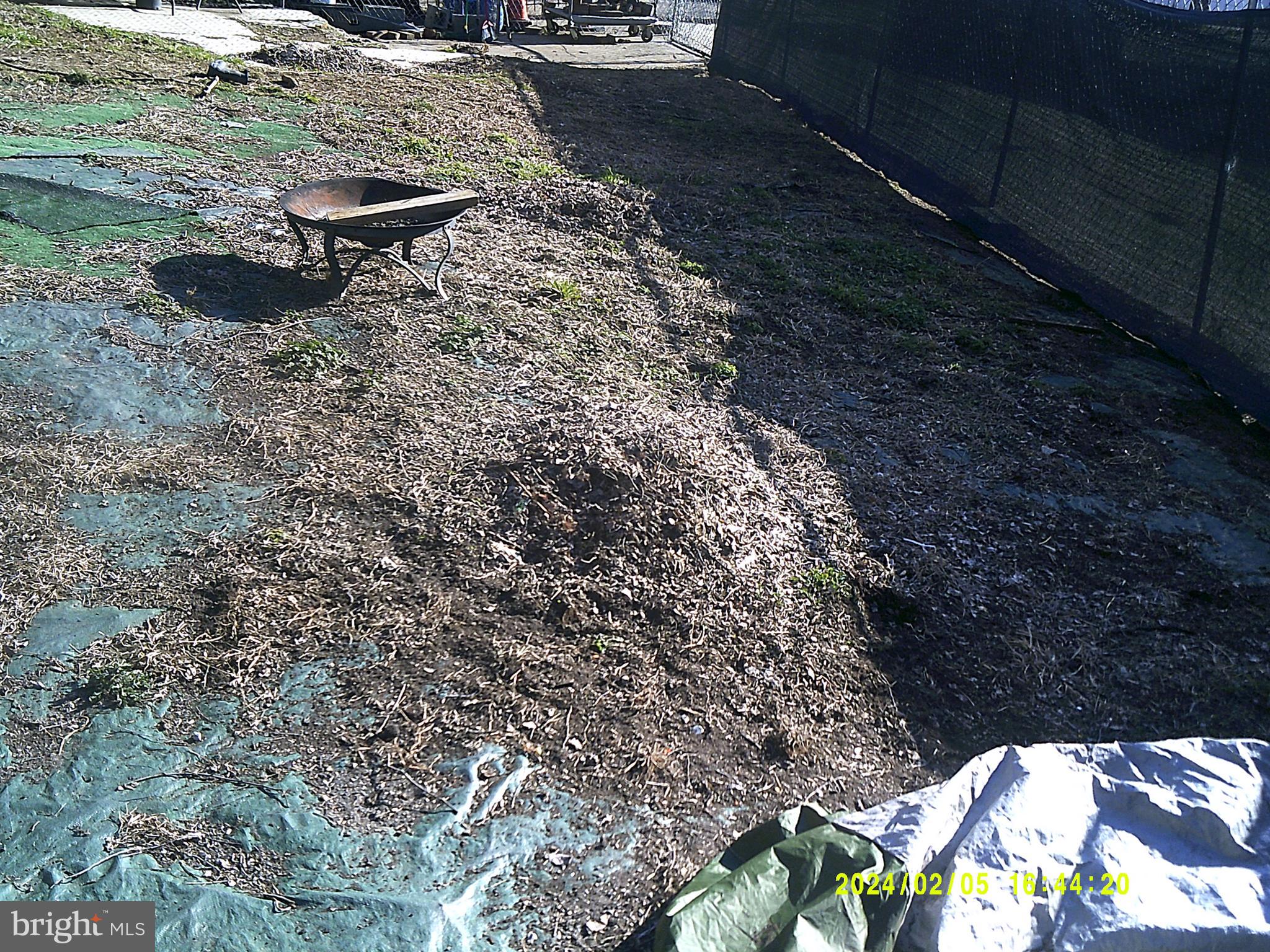 5201 Hawthorne Street Philadelphia, PA 19124 - Photo 5 of 8 a view of a backyard with chairs