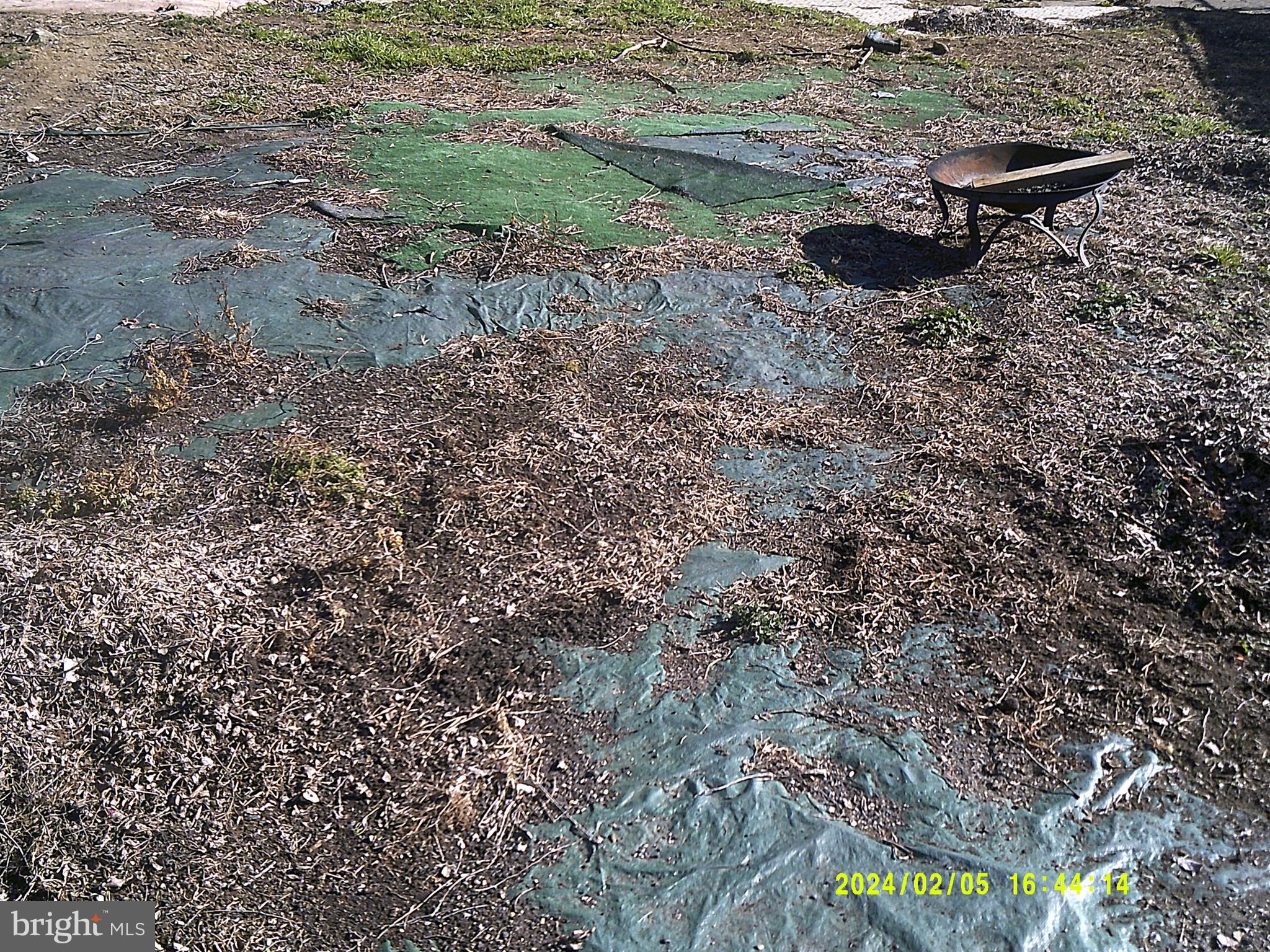5201 Hawthorne Street Philadelphia, PA 19124 - Photo 6 of 8 a view of a backyard of the house