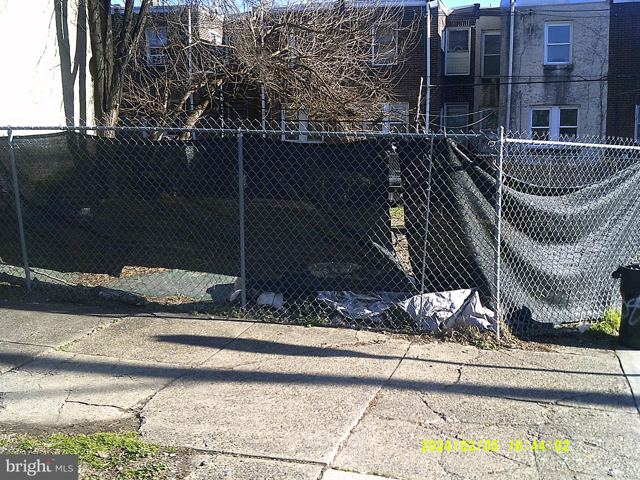 5201 Hawthorne Street Philadelphia, PA 19124 - Photo 8 of 8 a view of a house with a street