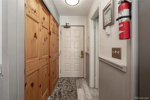 a bathroom with a shower and a sink