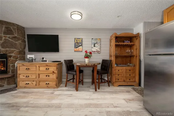 a view of a workspace with furniture