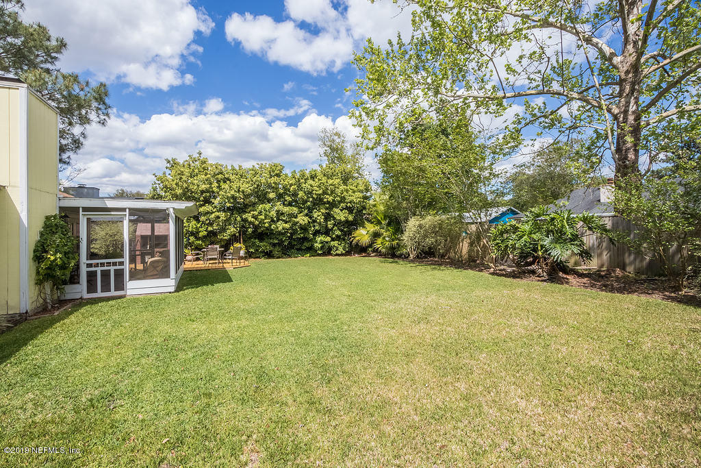 10969 Reading Road Jacksonville, FL 32257 - Photo 26 of 27 a view of a yard with an outdoor space