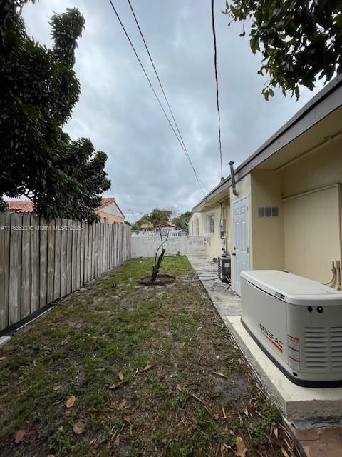 261 East 37th Street Hialeah, FL 33013 - Photo 12 of 13 a view of a backyard space of a house