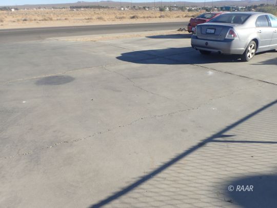 417 South Richmond Road Ridgecrest, CA 93555 - Photo 4 of 7 a car parked on the side of a road