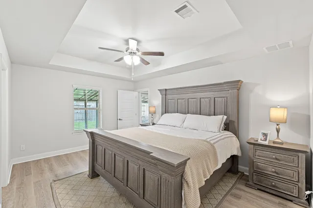 a living room with furniture rug and window