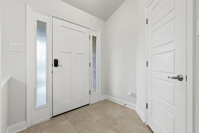 a view of a living room and dining room
