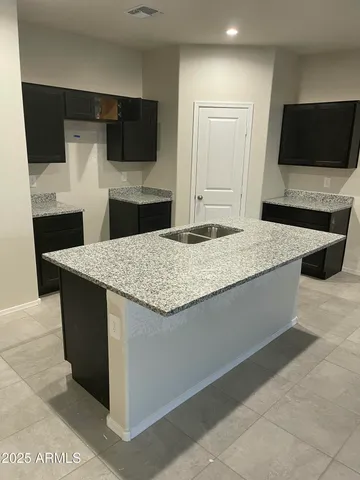 a living room with fireplace and flat screen tv