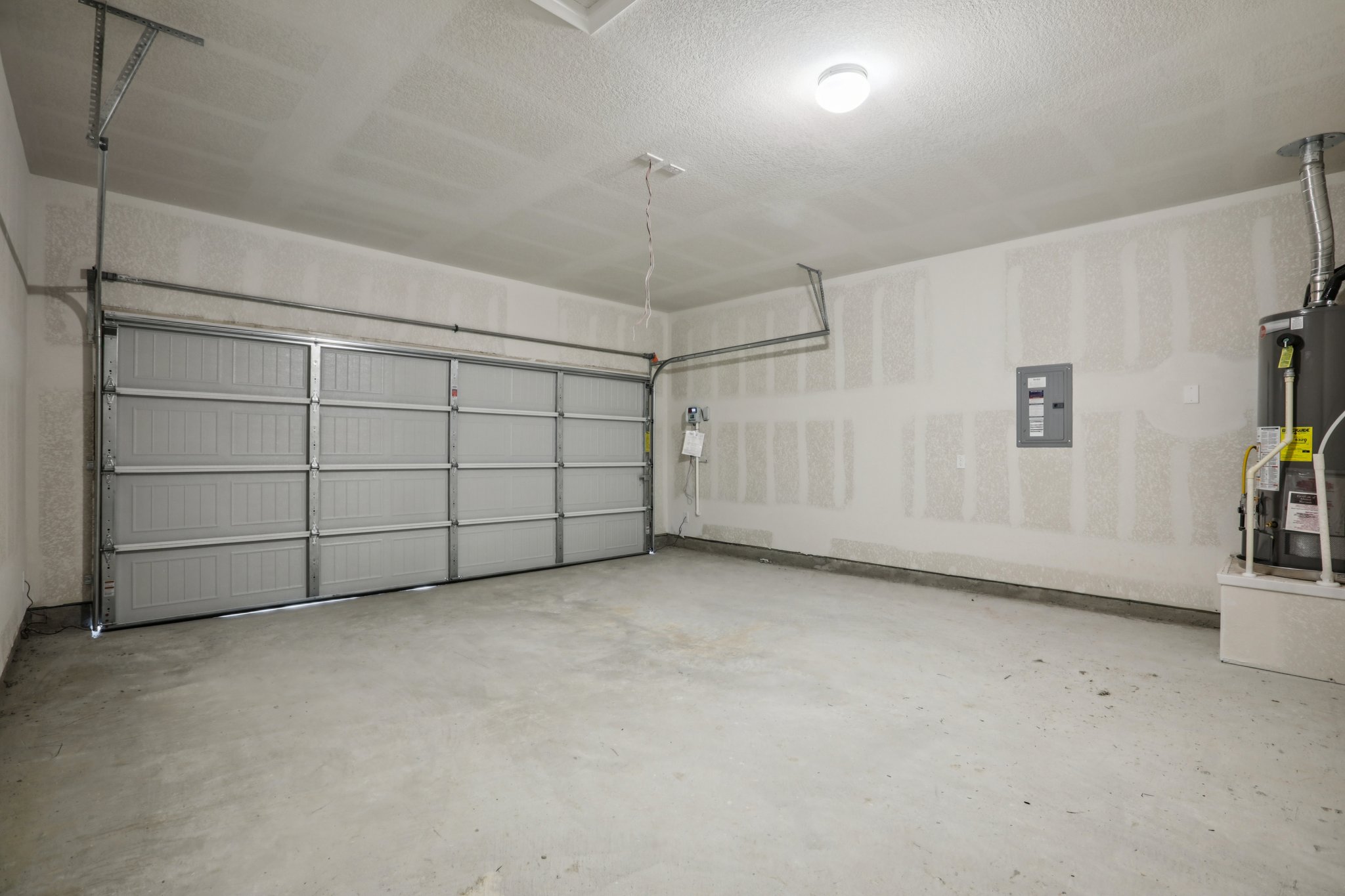 104 Summer Drive Elgin, TX 78621 - Photo 32 of 40 a view of a garage