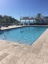 a view of a backyard of the house