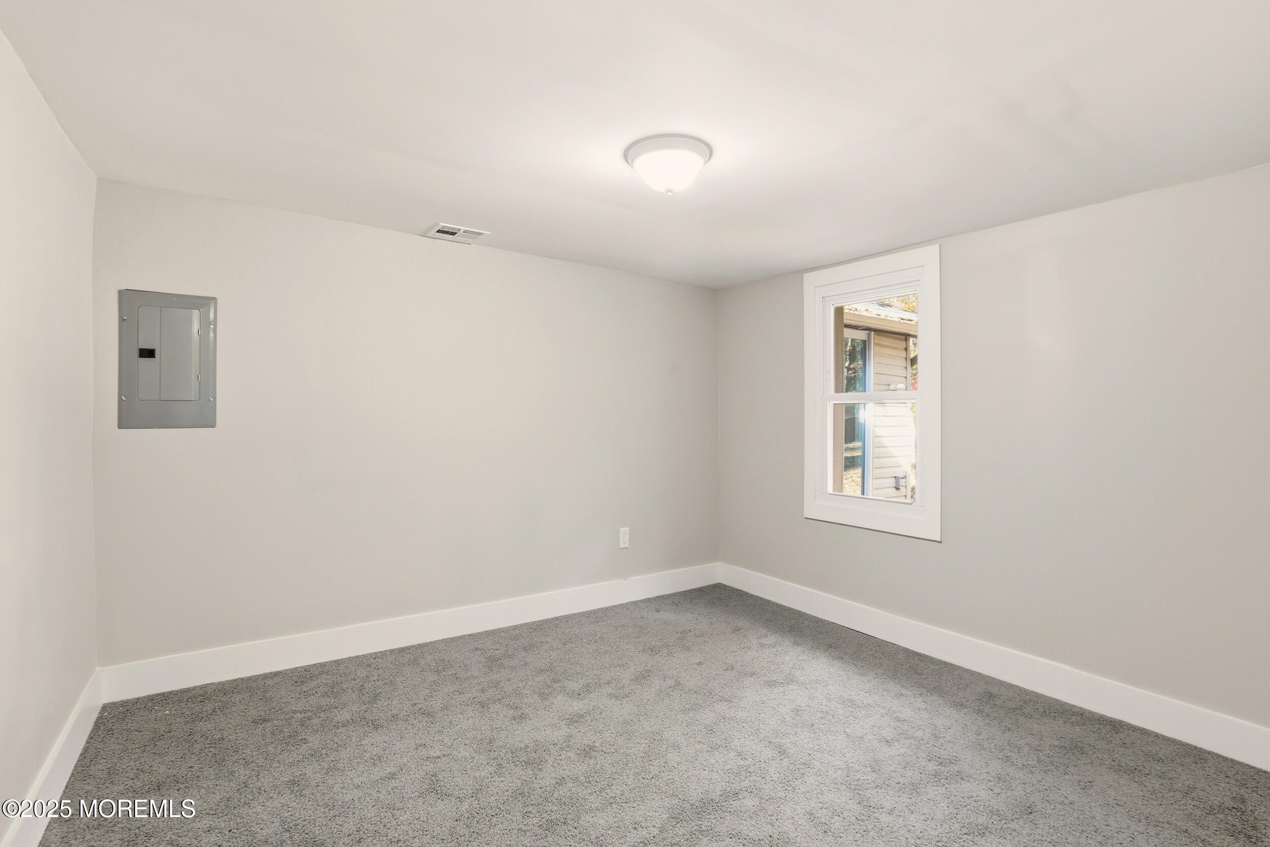 31 Rappleyea Court Howell, NJ 07731 - Photo 12 of 30 an empty room with a window