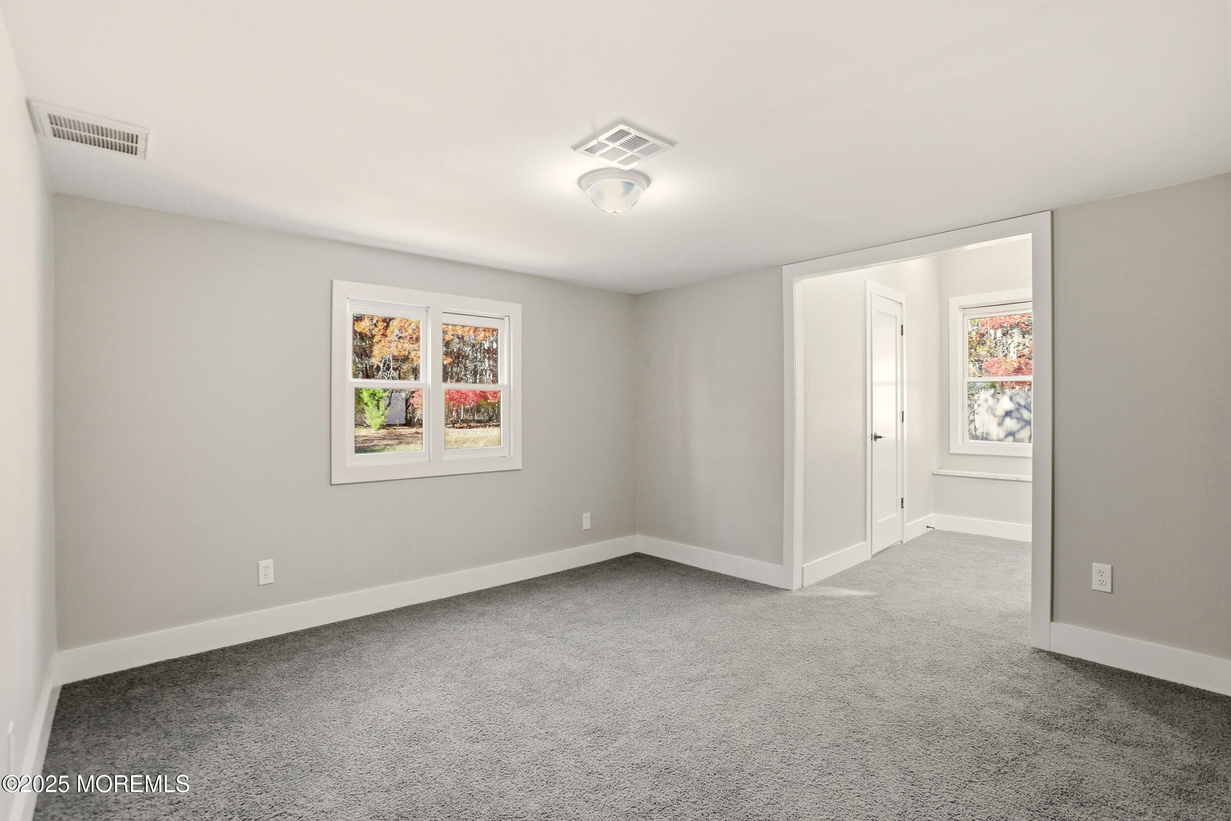 31 Rappleyea Court Howell, NJ 07731 - Photo 16 of 30 an empty room with windows and closet