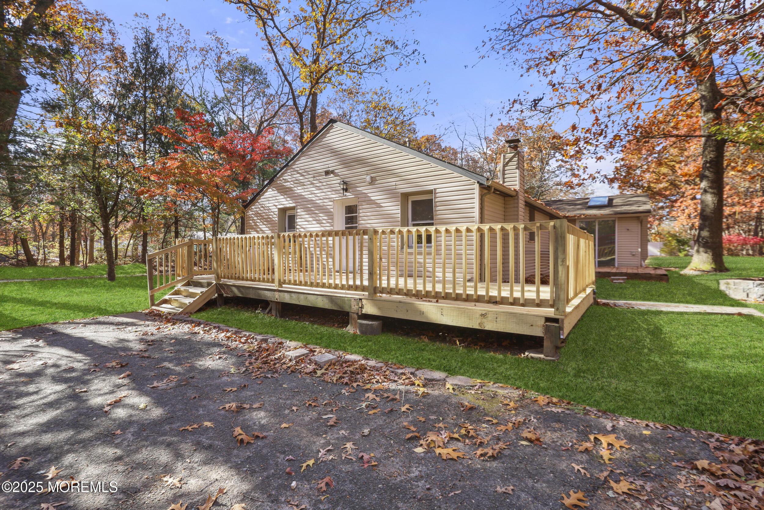 31 Rappleyea Court Howell, NJ 07731 - Photo 19 of 30 a view of a house with a yard and deck
