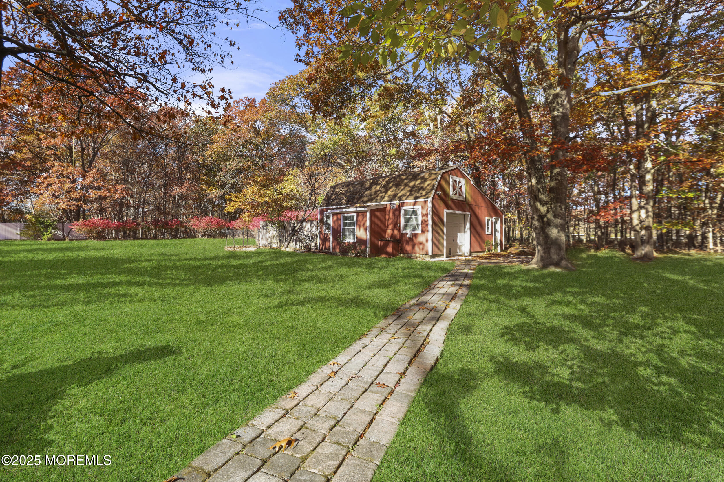 31 Rappleyea Court Howell, NJ 07731 - Photo 20 of 30 a backyard of a house with lots of green space