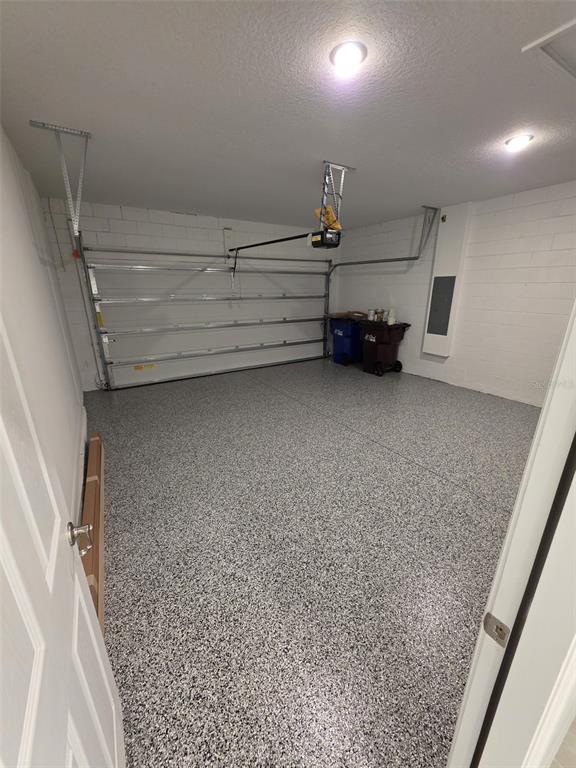 6008 Vision Road St. Cloud, FL 34771 - Photo 32 of 33 a view of room and empty room with wooden floor