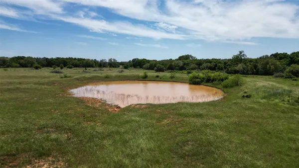 a view of a lake with houses