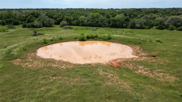 a view of a lake with a city