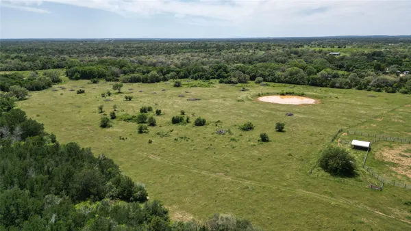a view of a lake with a building in the back