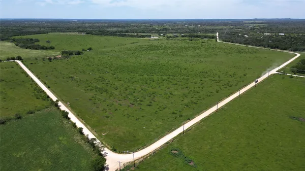 a view of a city with an ocean