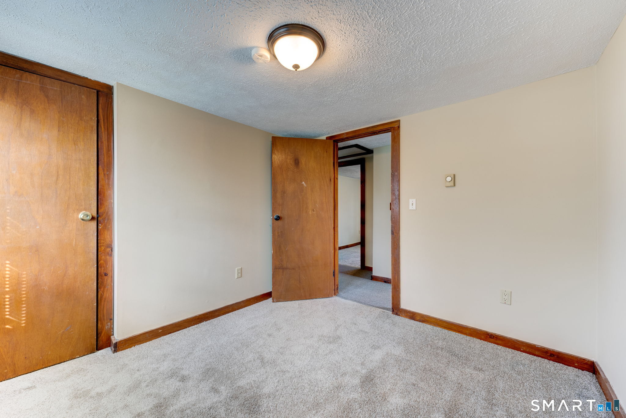 8 Maple Avenue Plymouth, CT 06782 - Photo 12 of 20 an empty room with a window