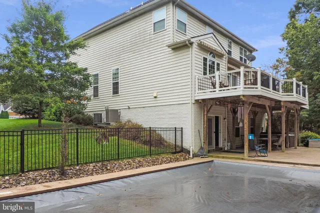 a view of a gate and fence