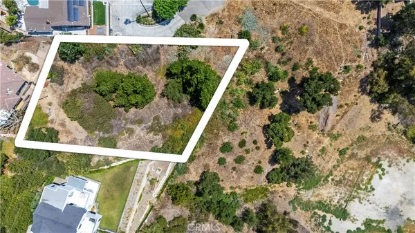 a view of balcony with wooden floor