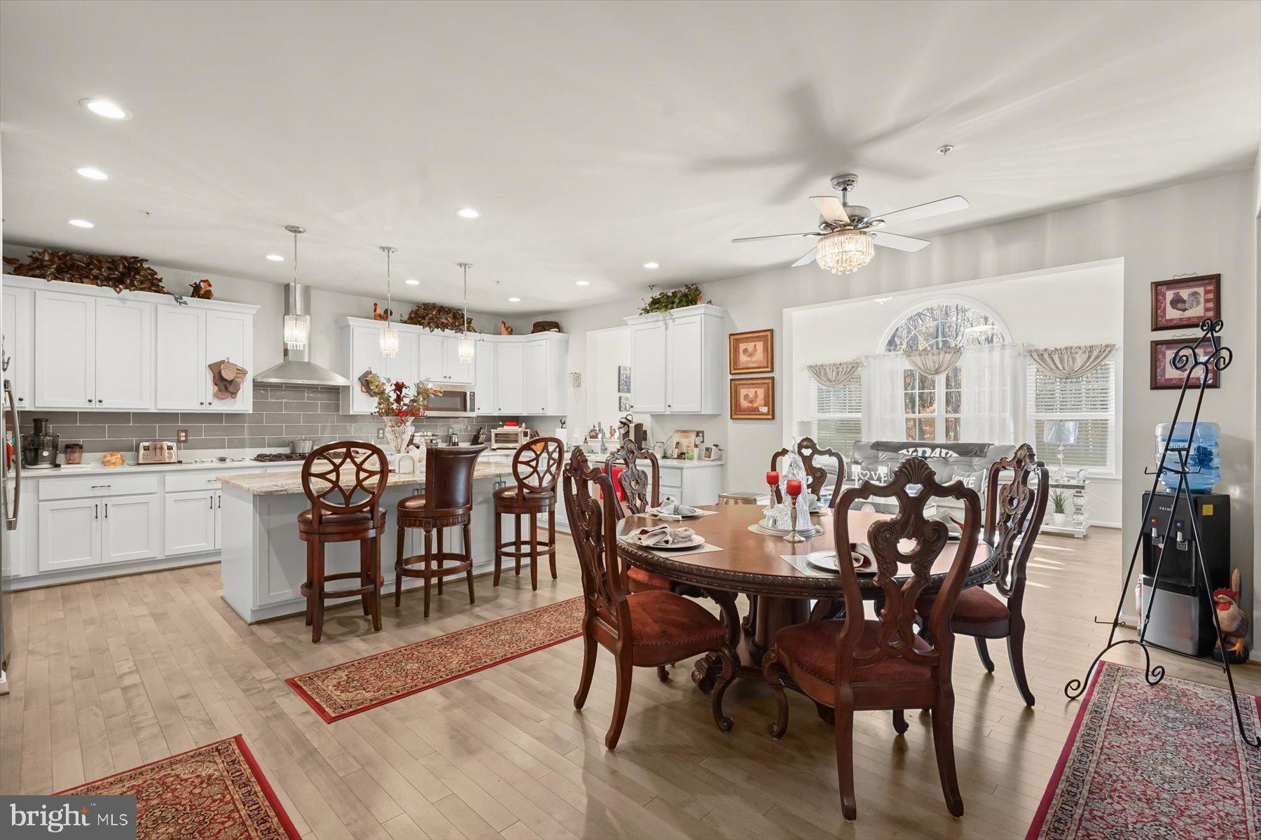 2102 St James Road Accokeek, MD 20607 - Photo 16 of 43 a view of a dining room with furniture and chandelier
