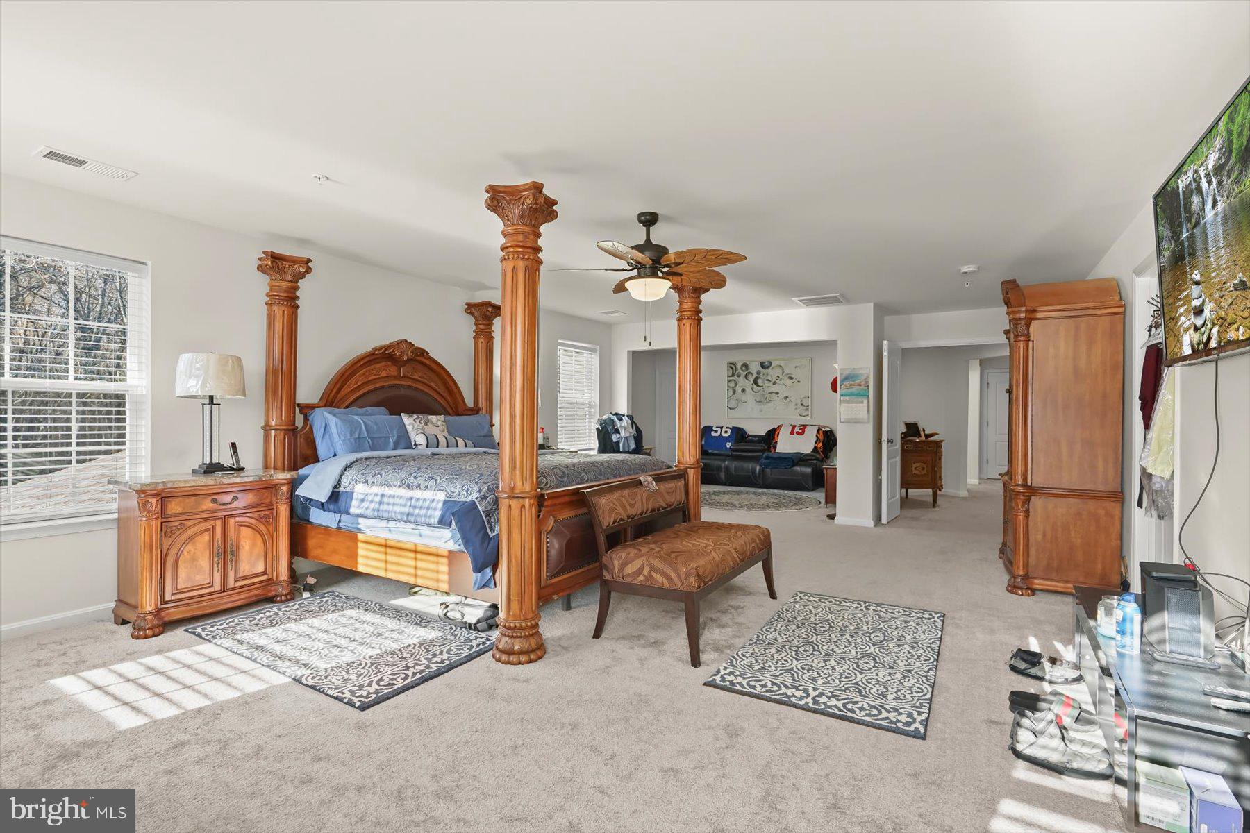 2102 St James Road Accokeek, MD 20607 - Photo 21 of 43 a living room with furniture a rug and gym equipment