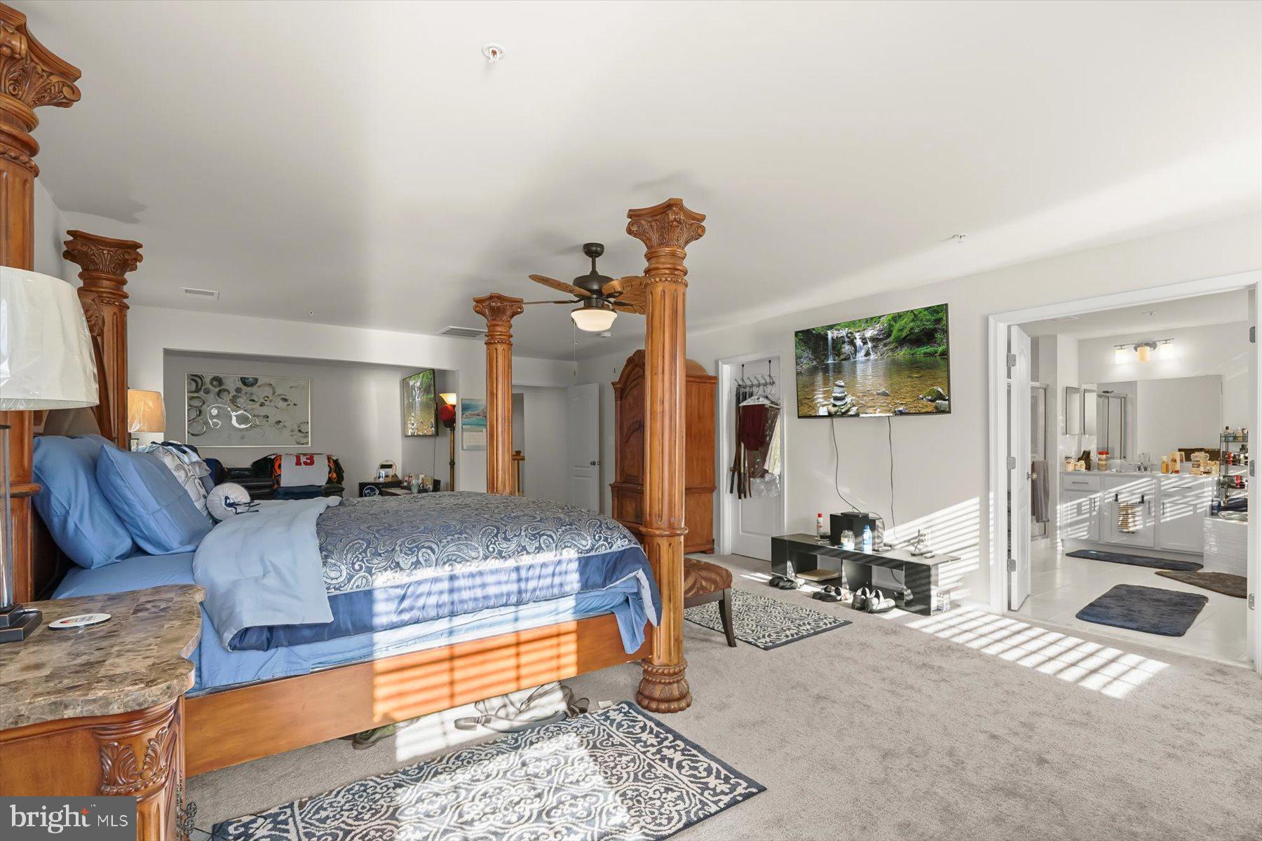 2102 St James Road Accokeek, MD 20607 - Photo 22 of 43 a living room with furniture and a chandelier