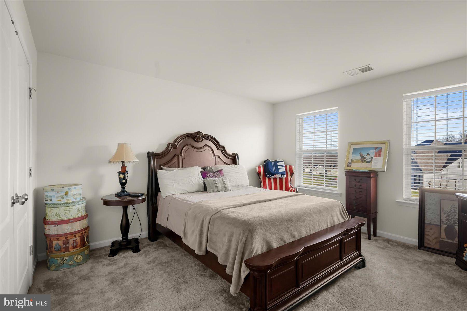 2102 St James Road Accokeek, MD 20607 - Photo 26 of 43 a bedroom with a bed and a window