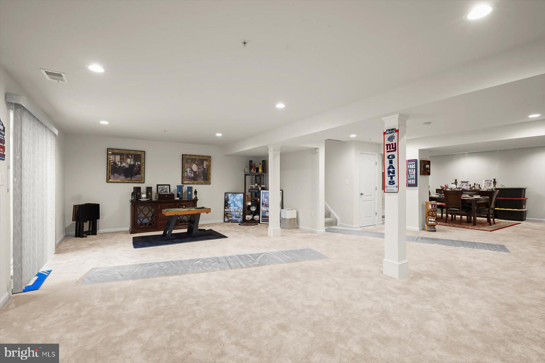 2102 St James Road Accokeek, MD 20607 - Photo 34 of 43 a living room with furniture and a flat screen tv