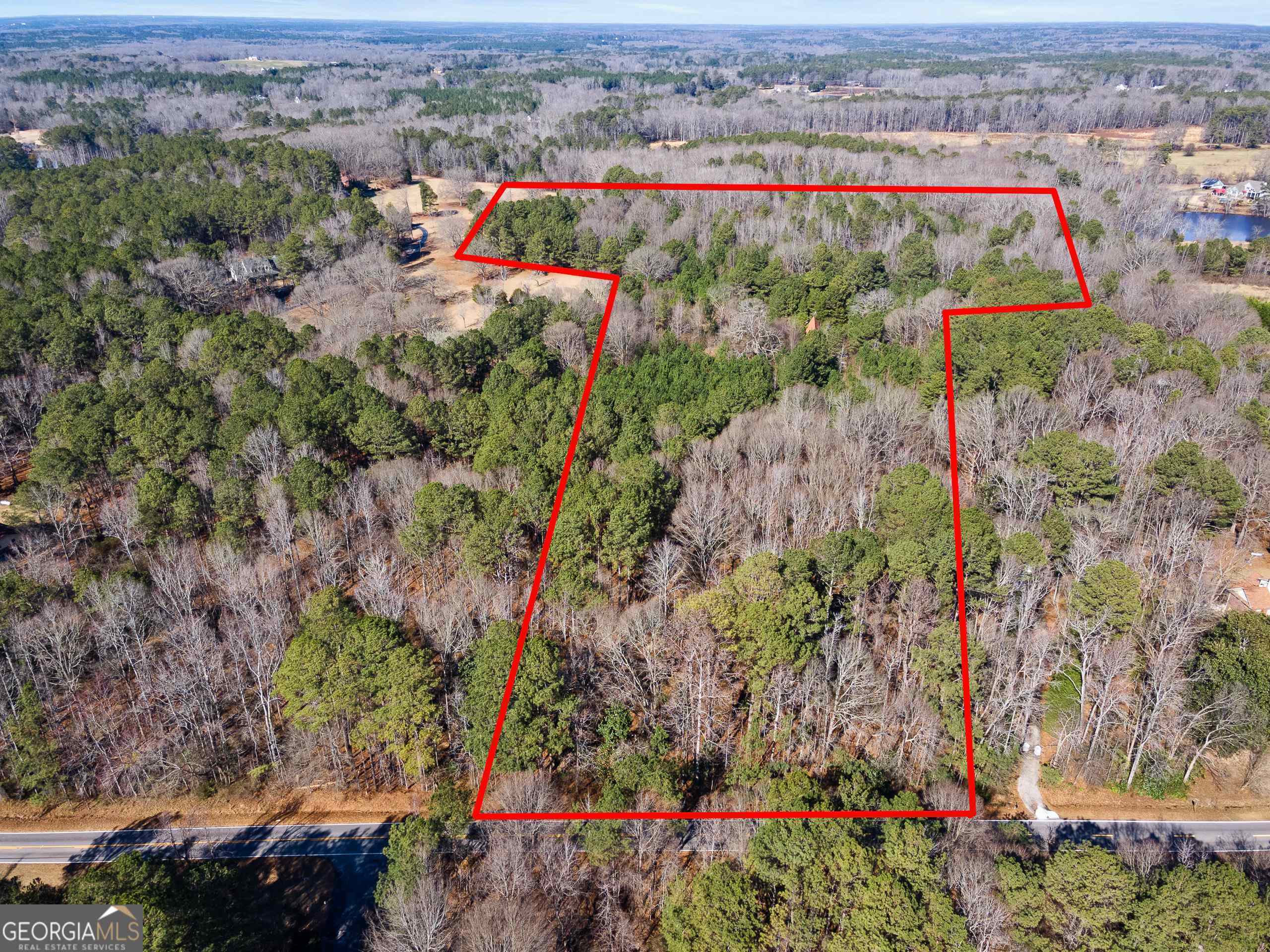an aerial view of beach and residential houses