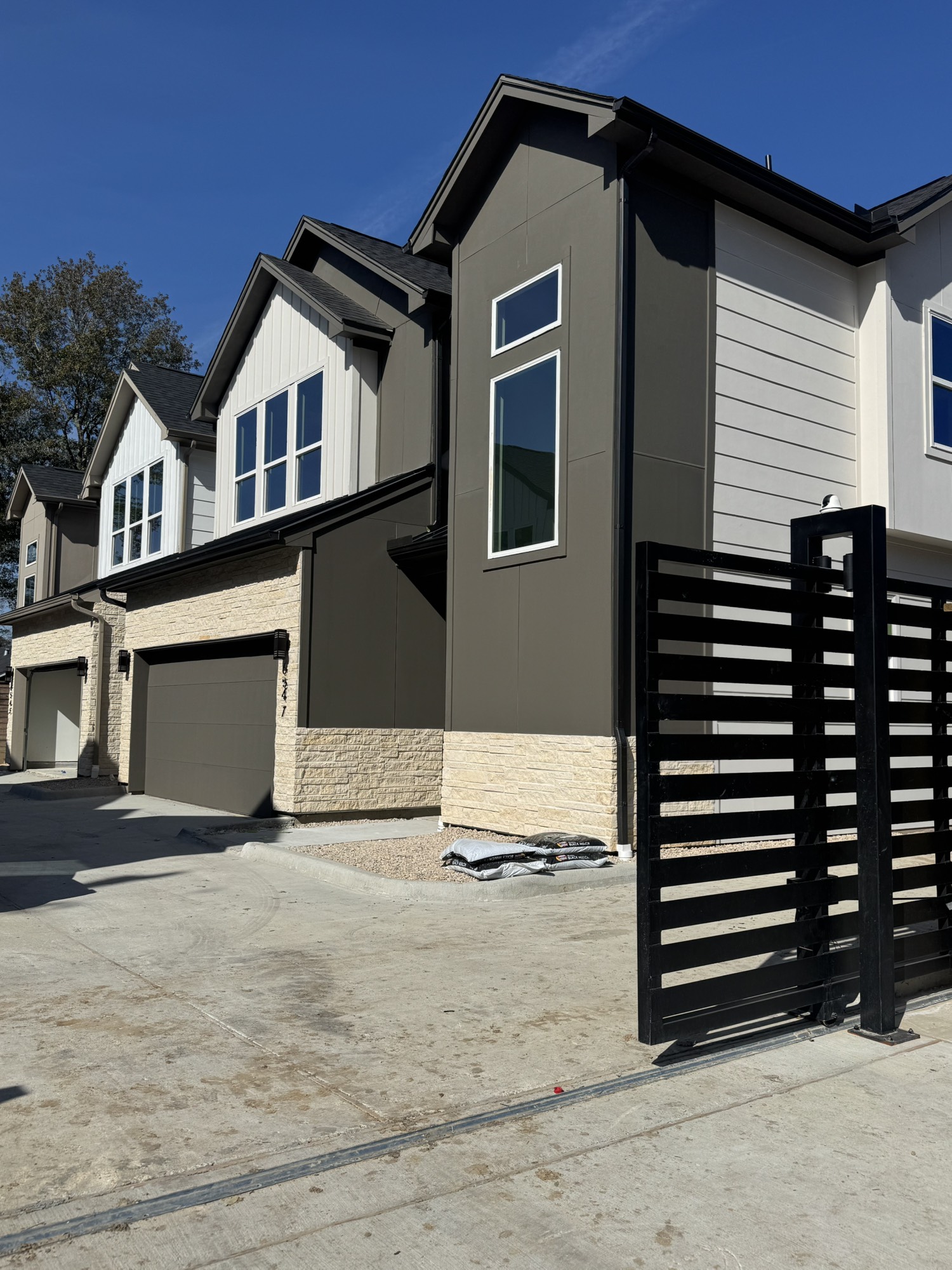 6543 Sealey Street Houston, TX 77091 - Photo 1 of 6 a front view of a house with a yard