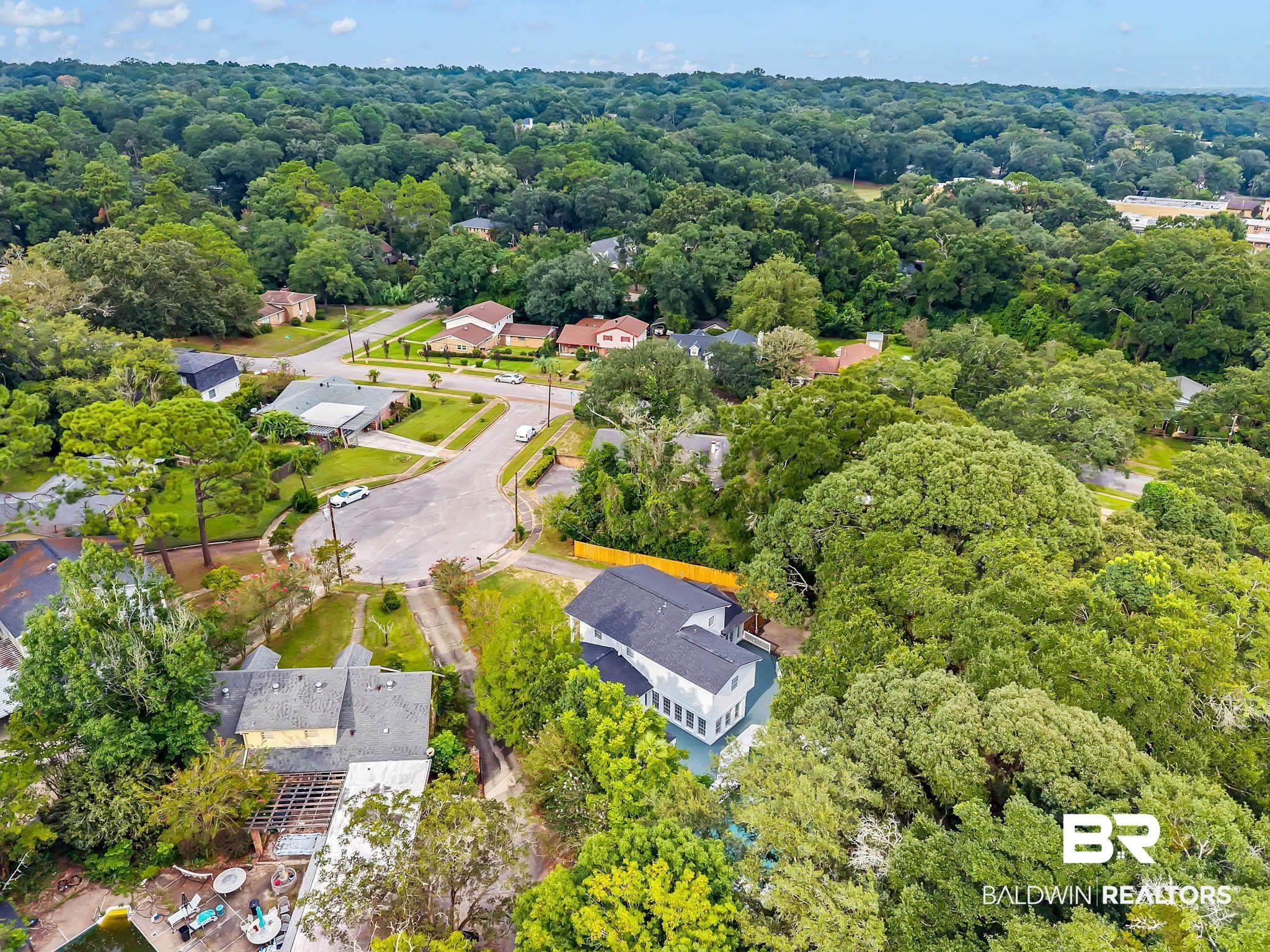 4705 Sherry Court Mobile, AL 36693 - Photo 82 of 100 Aerial view of residential area with a forest