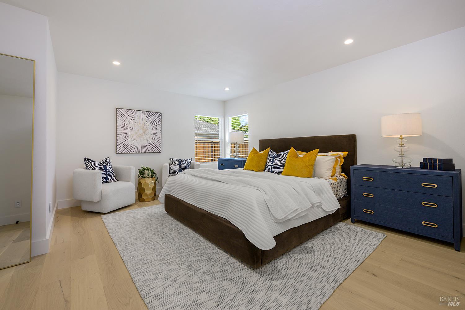 2152 Montecito Avenue Santa Rosa, CA 95404 - Photo 22 of 47 a bedroom with a large bed and a couch