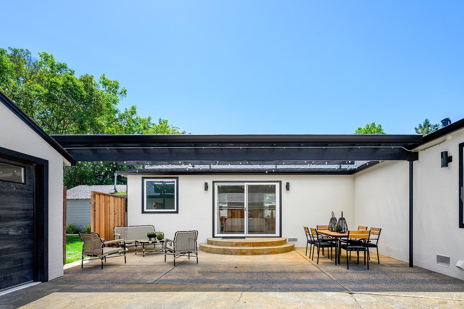 2152 Montecito Avenue Santa Rosa, CA 95404 - Photo 34 of 47 a backyard of a house with table and chairs