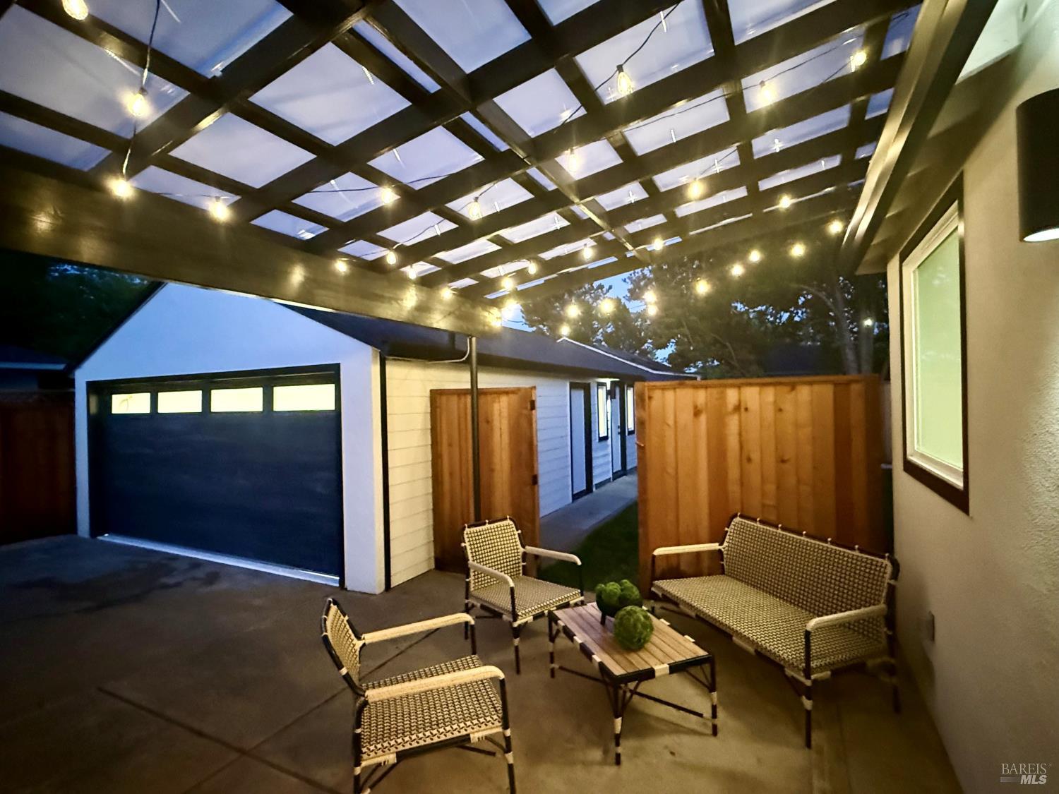 2152 Montecito Avenue Santa Rosa, CA 95404 - Photo 45 of 47 a view of a porch with furniture and a yard