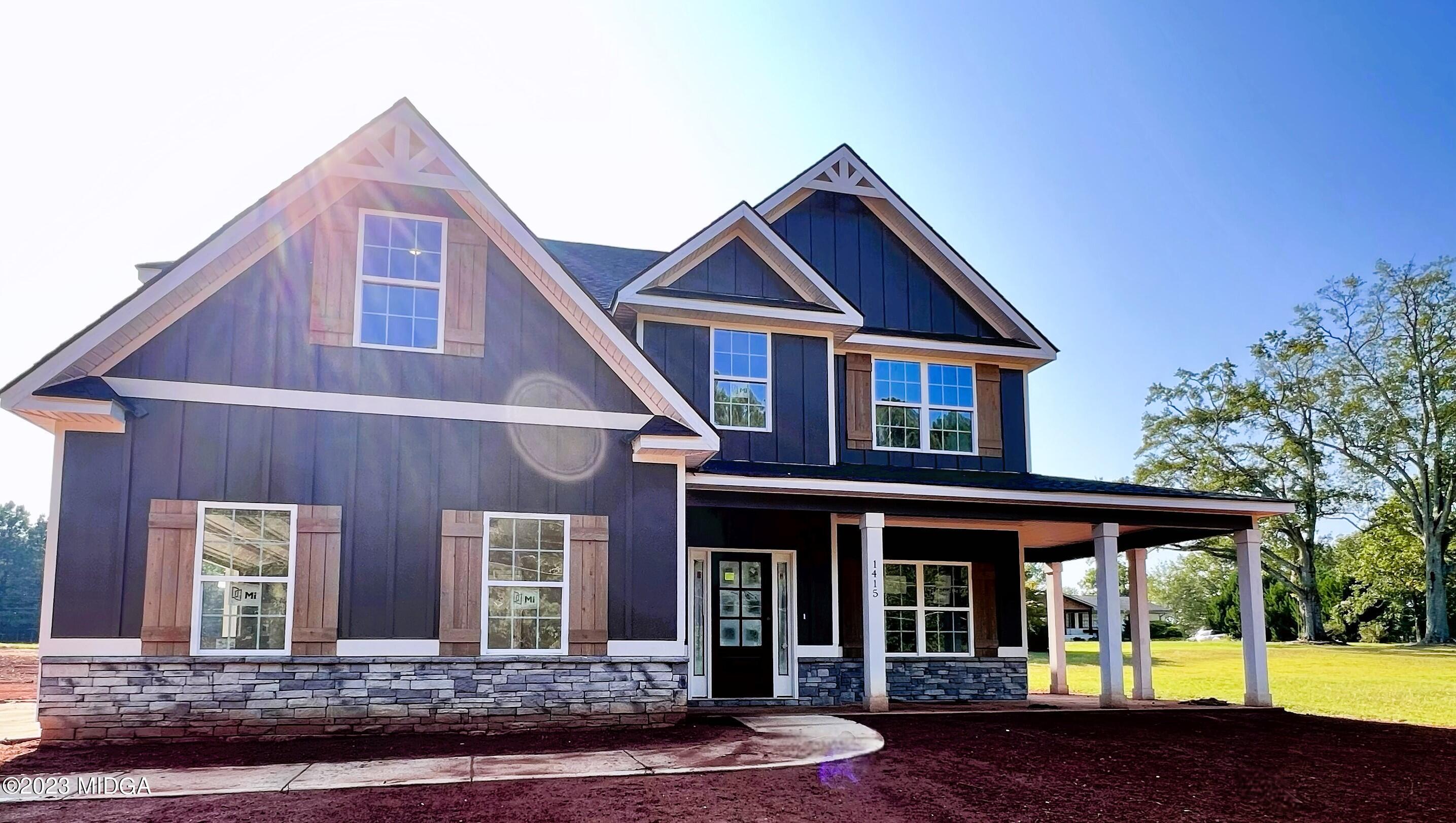 a front view of house with yard